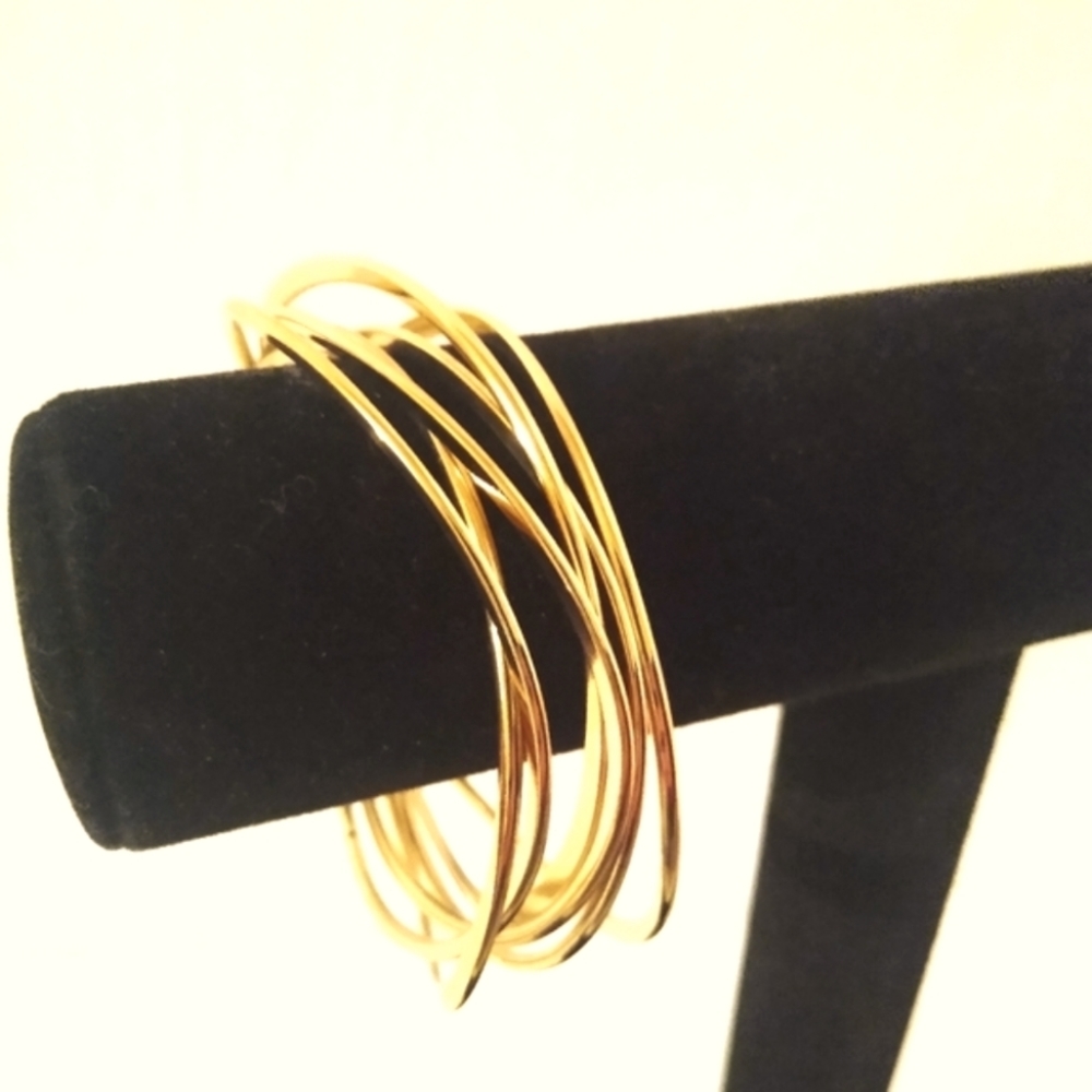 Set of 6 gold tone Cookie Lee Bangles